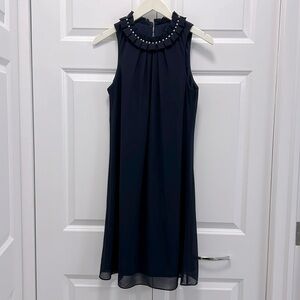 Jessica Howard sleeveless trap dress.